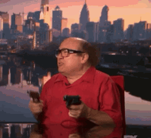 danny-devito-guns.gif