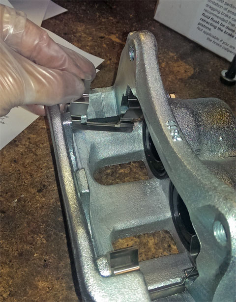 Inserting-brake-clips.jpg